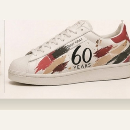 Sneaker Anniversary 60 – weißes Leder mit goldener 60-Stickerei